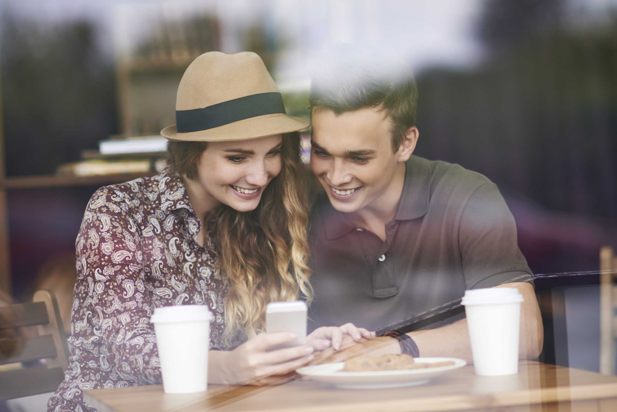 engaged couple looking at marriage questions